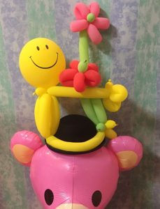 ニコちゃんとお花バルーンの被り物